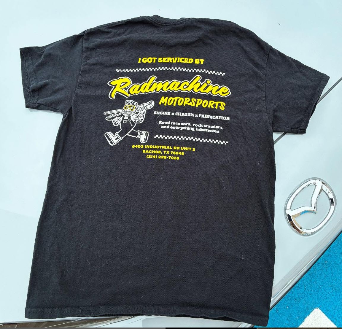 “I Got Serviced by Radmachine” Shop Tee - Black